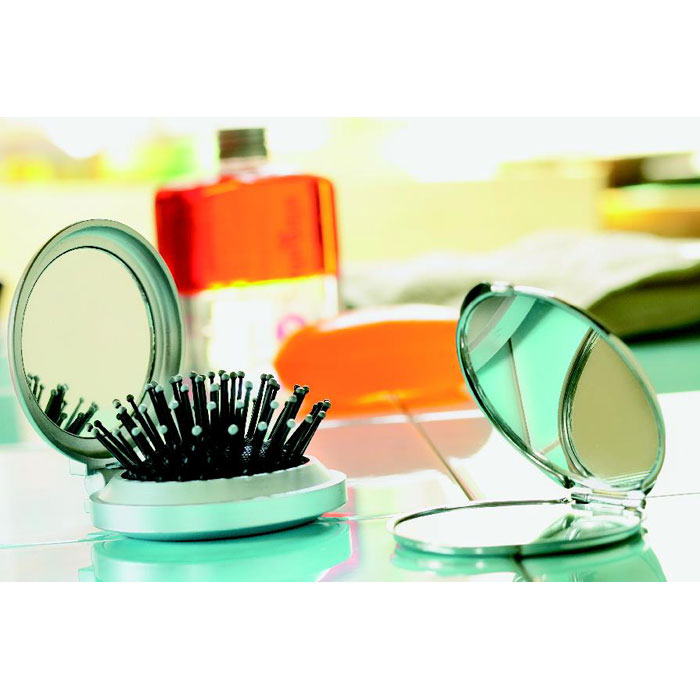 Brosse/miroir pliable